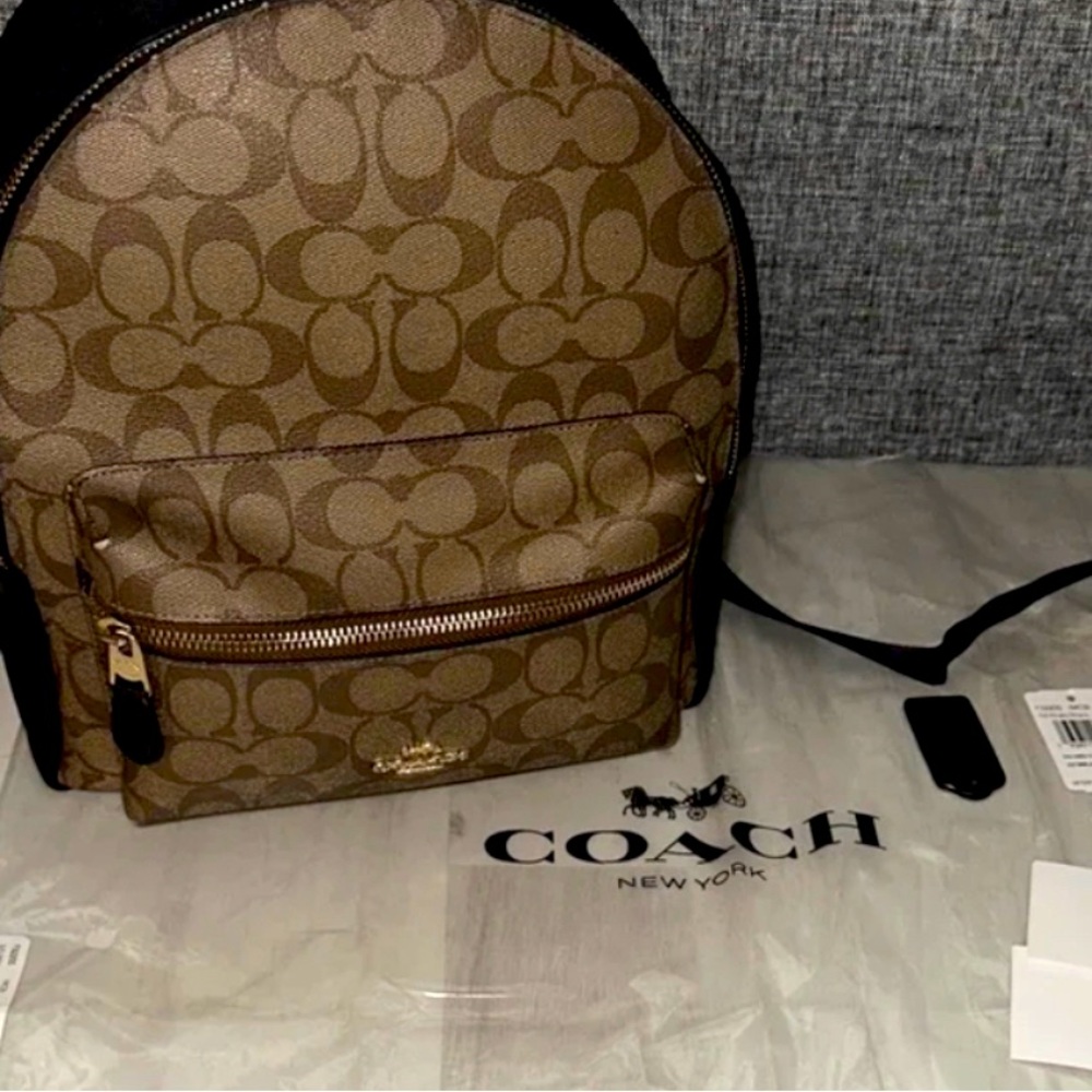 Authentic leather Coach backpack with wallet